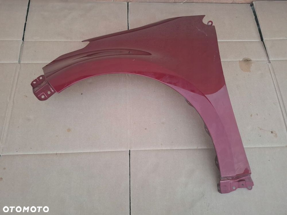 BŁOTNIK PRZEDNI TOYOTA YARIS IV ORYGINAŁ - 1