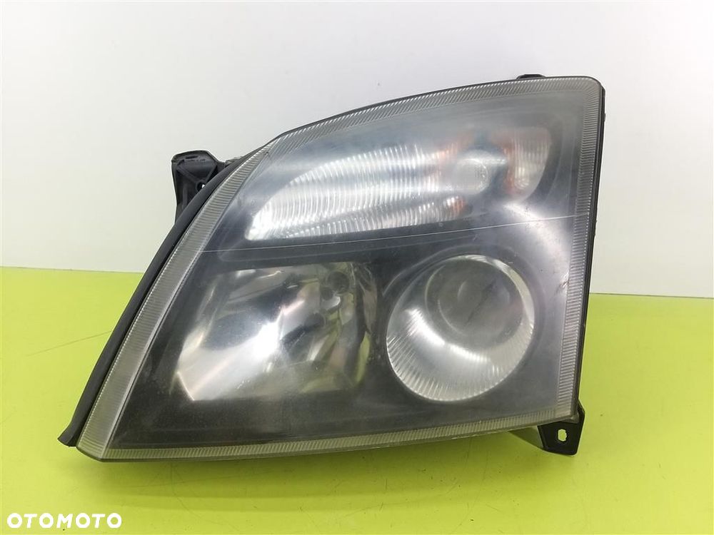 Reflektor lampa przód lewa Opel Vectra C 2002-2005 HELLA oryginał OPEL - 1