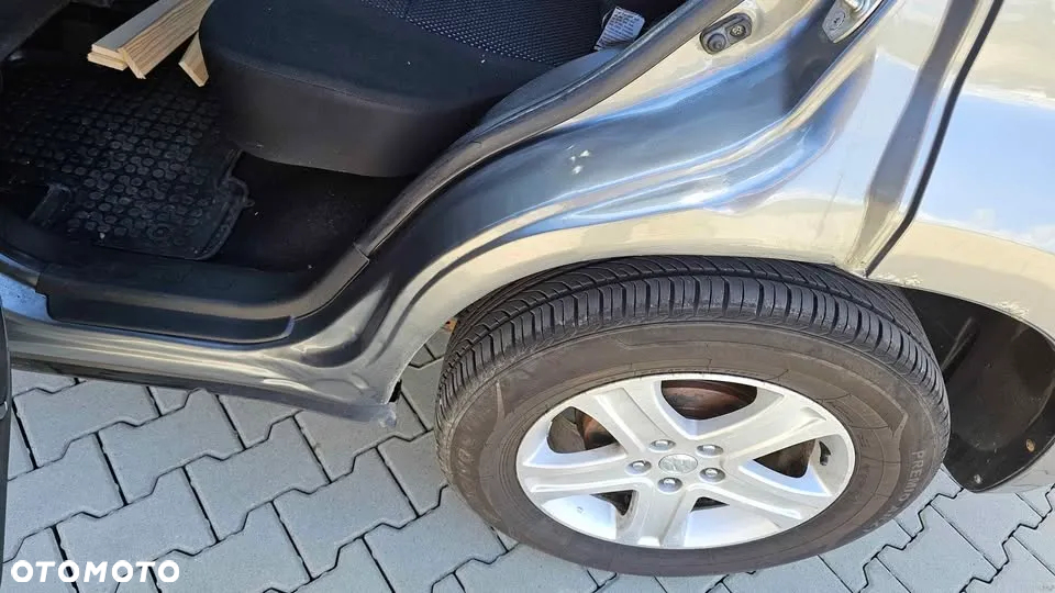 Suzuki Grand Vitara 2.0 - 14