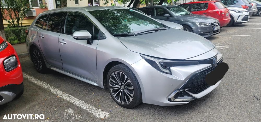 Toyota Corolla 1.8 HSD Exclusive - 6