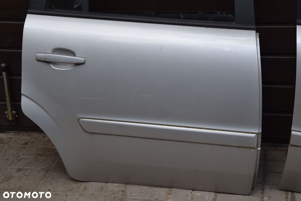 Opel Zafira B 05-14 Drzwi Prawy przód tył prawe przednie tylne srebrne Z157 bez korozji - 2