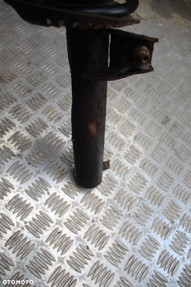 MCPHERSON AMORTYZATOR LEWY PRZÓD VW GOLF V 1.6 - 4