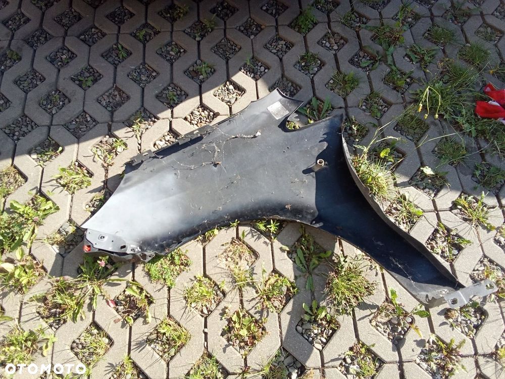 KL BŁOTNIK PRAWY PRZÓD OPEL CORSA D 06- 5D - 6