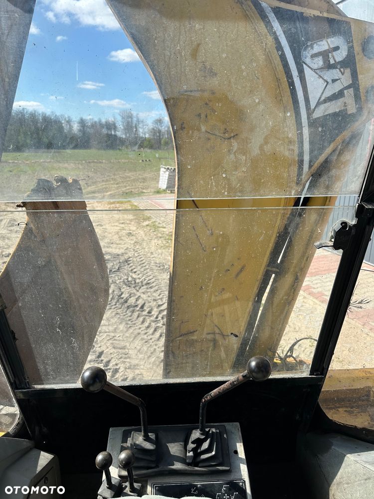 Caterpillar 428B ramię typu Banan - 8