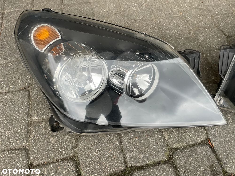 OPEL ASTRA H III LIFT PRZÓD KOMPLETNY ZDERZAK LAMPA REFLEKTOR LEWY przedni GRILL lampa reflektor LEWA PRAWA GTC Hella Z167 - 3