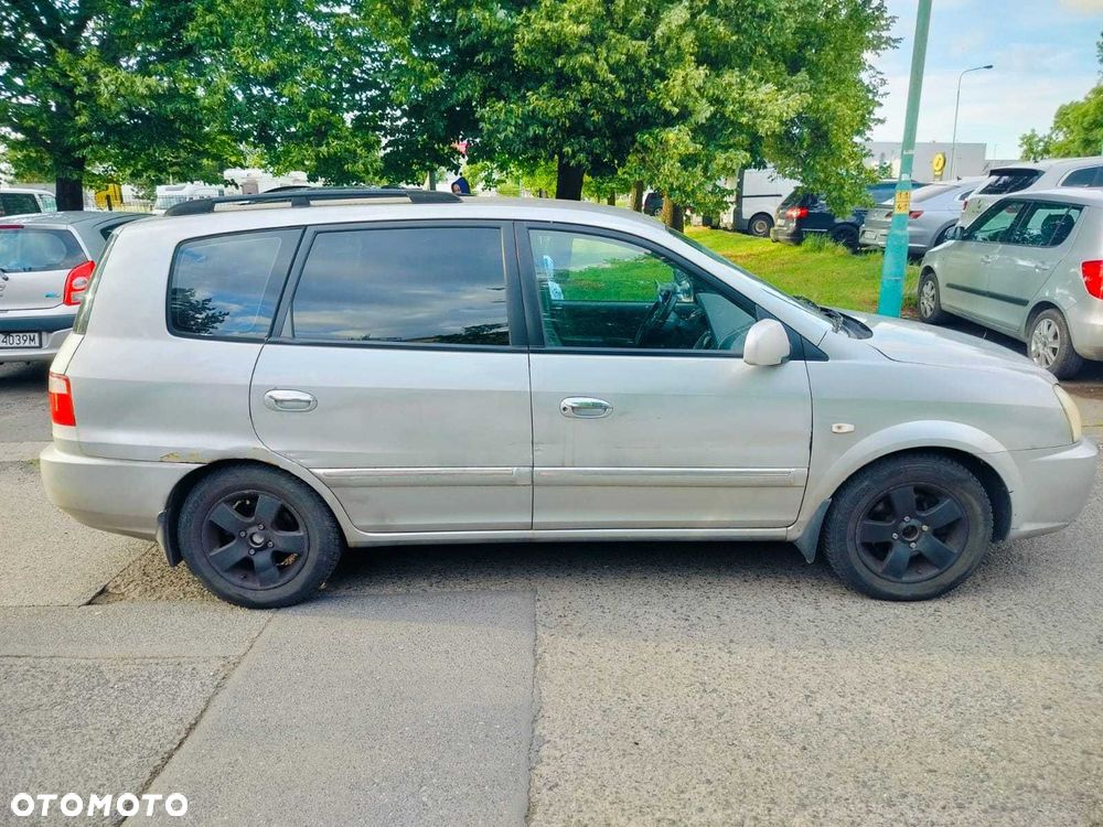 Kia Carens - 4