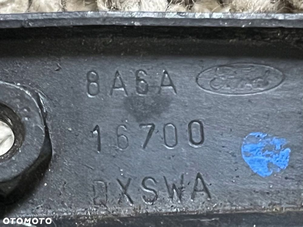 8V51-A16860-AA UCHWYT ZAMKA MASKI FORD FIESTA MK7 - 11