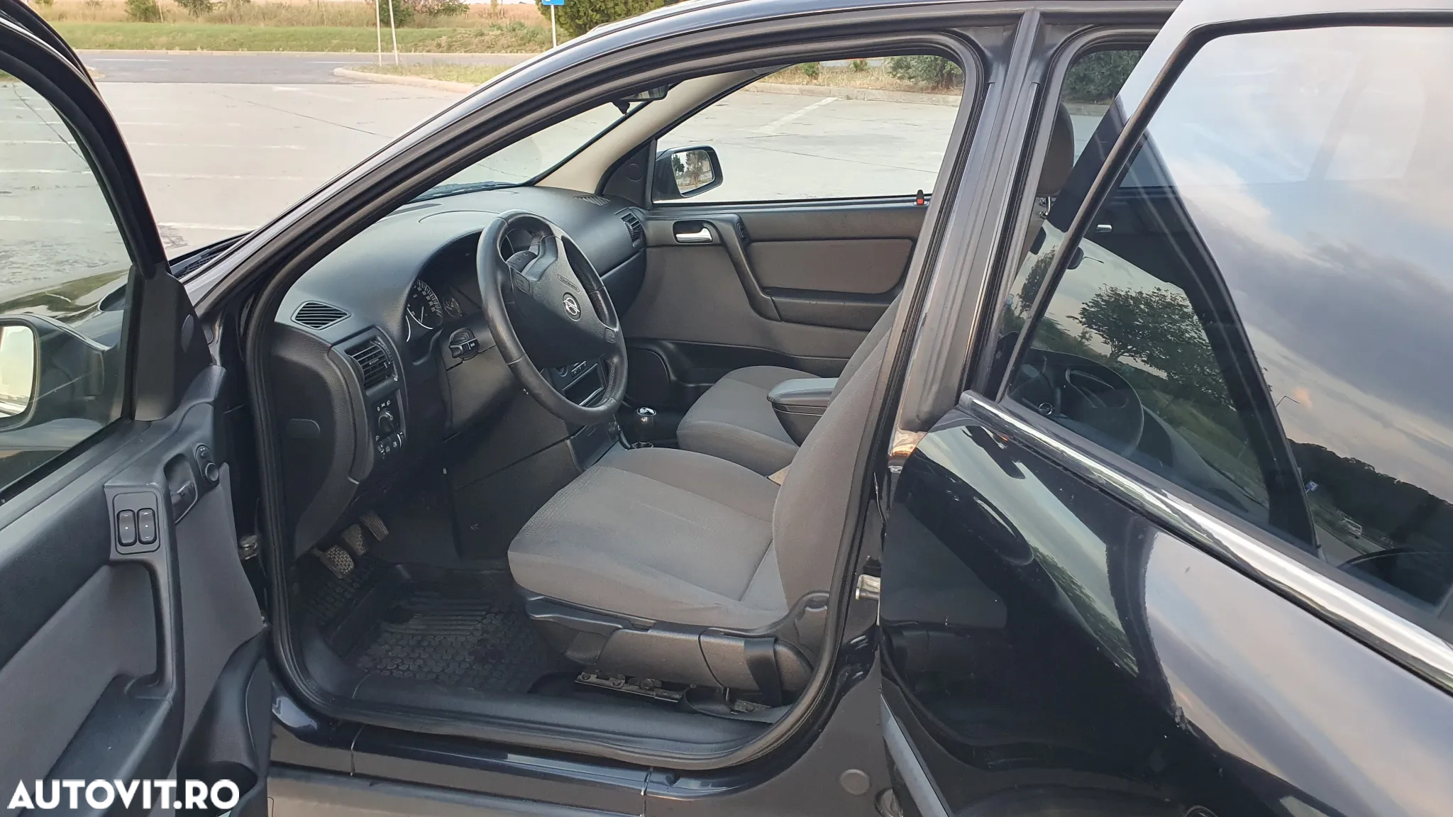Opel Astra 1.4i 16V Club - 12