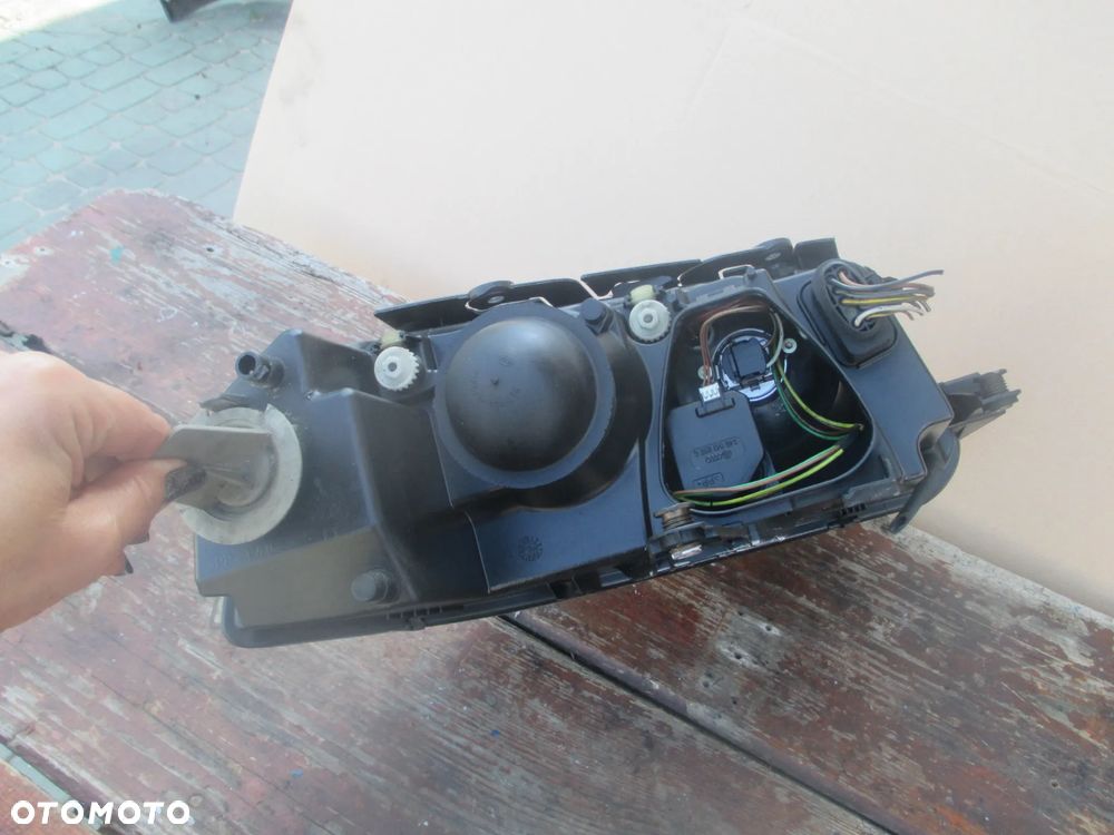 lampa lewa VW Passat B5 lift Hella Europa - 3