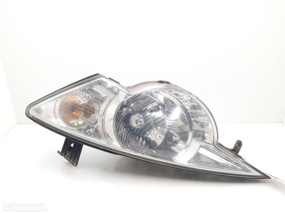 FAROL ESQUERDO SSANGYONG ACTYON - 1