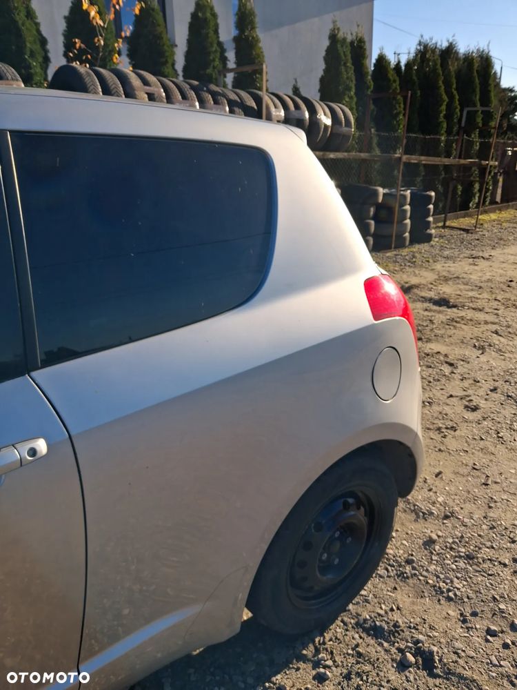 Suzuki Swift 3d 05 Blotnik lewy tylny ZCC - 2
