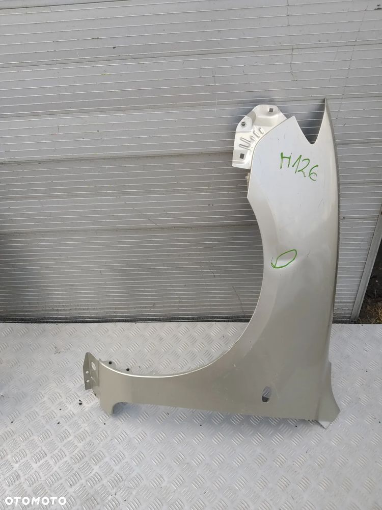 E763/F770/H3/H126/H131/H437/H438/H604 LEWY BŁOTNIK MAZDA 3 SEDAN - 6