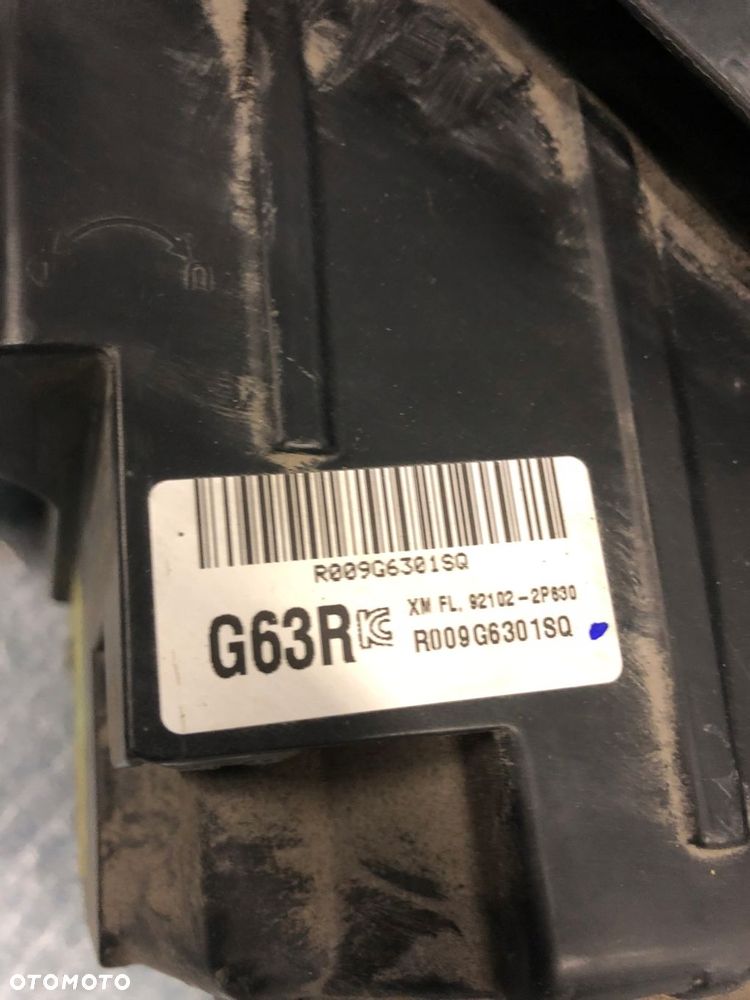 REFLEKTOR PRAWY KIA SORENTO II LIFT xenon KOMPLETNY nr.00 - 5