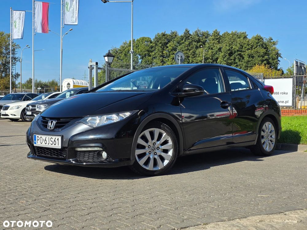 Honda Civic 1.4 i-VTEC Comfort - 1