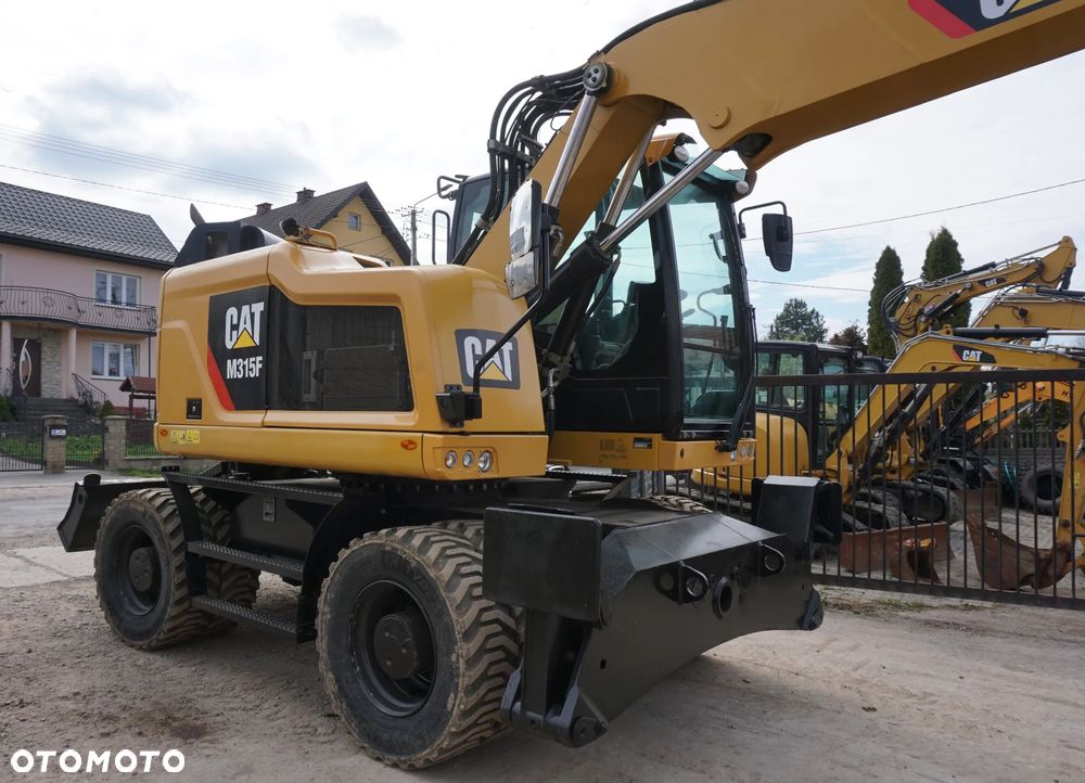 Caterpillar CAT M 315 F - 5