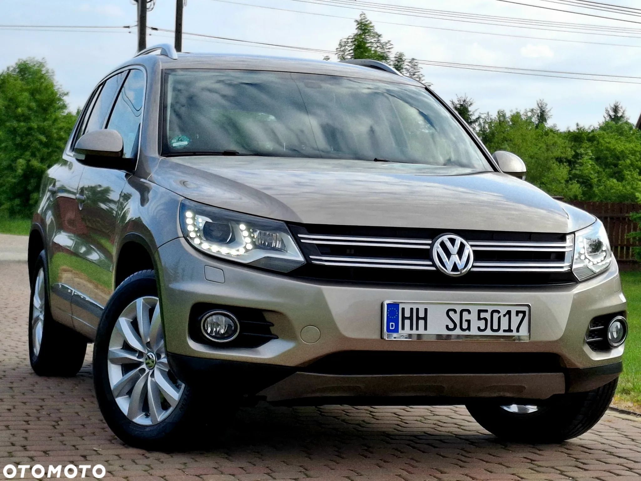 Volkswagen Tiguan 2.0 TDI DPF 4Motion BlueMotion Technology DSG Cup Sport & Style - 1
