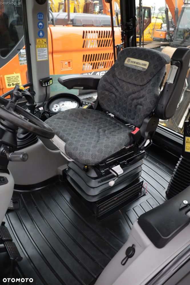 New Holland B100C - 24