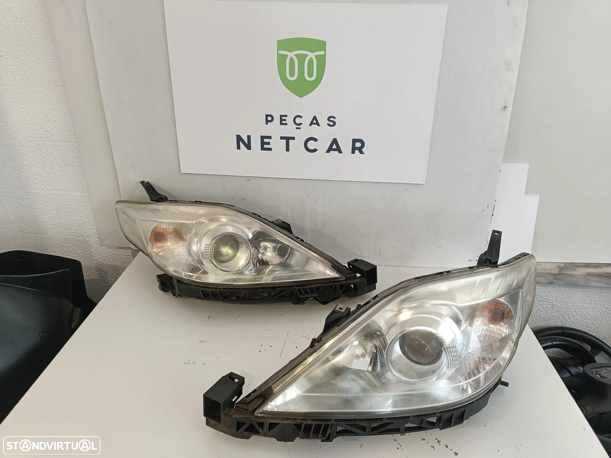 Farol óptica esquerdo Mazda 5 2009 - 3