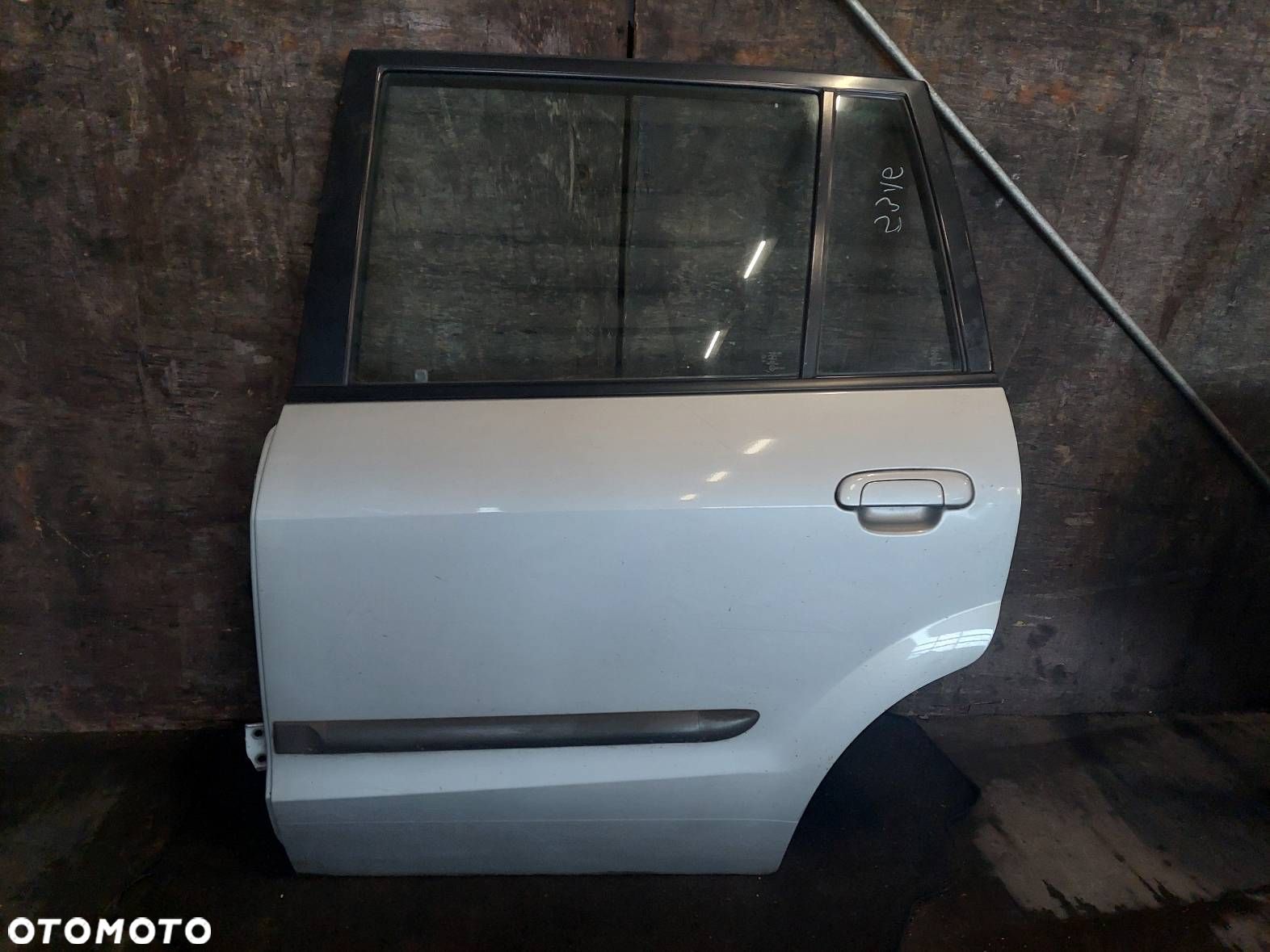 DRZWI KOMPLETNE LEWY TYŁ MAZDA PREMACY I 18G - 1
