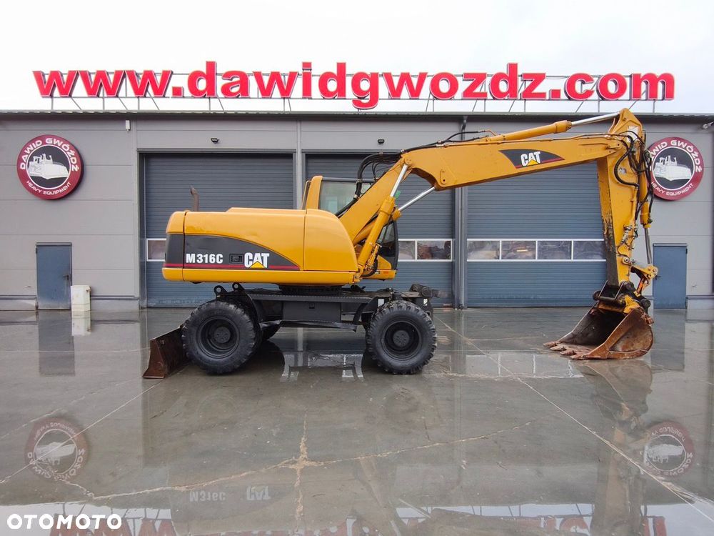 Caterpillar M316C - 3