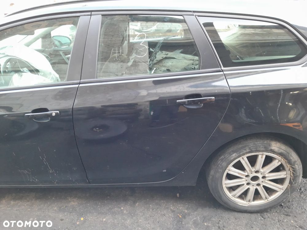 Drzwi tylne lewe OPEL Astra J kombi 09-19r. Z22C - 1