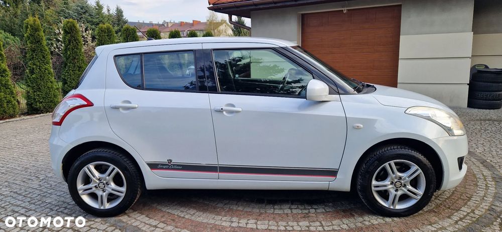 Suzuki Swift 1.2 4x4 Club - 7