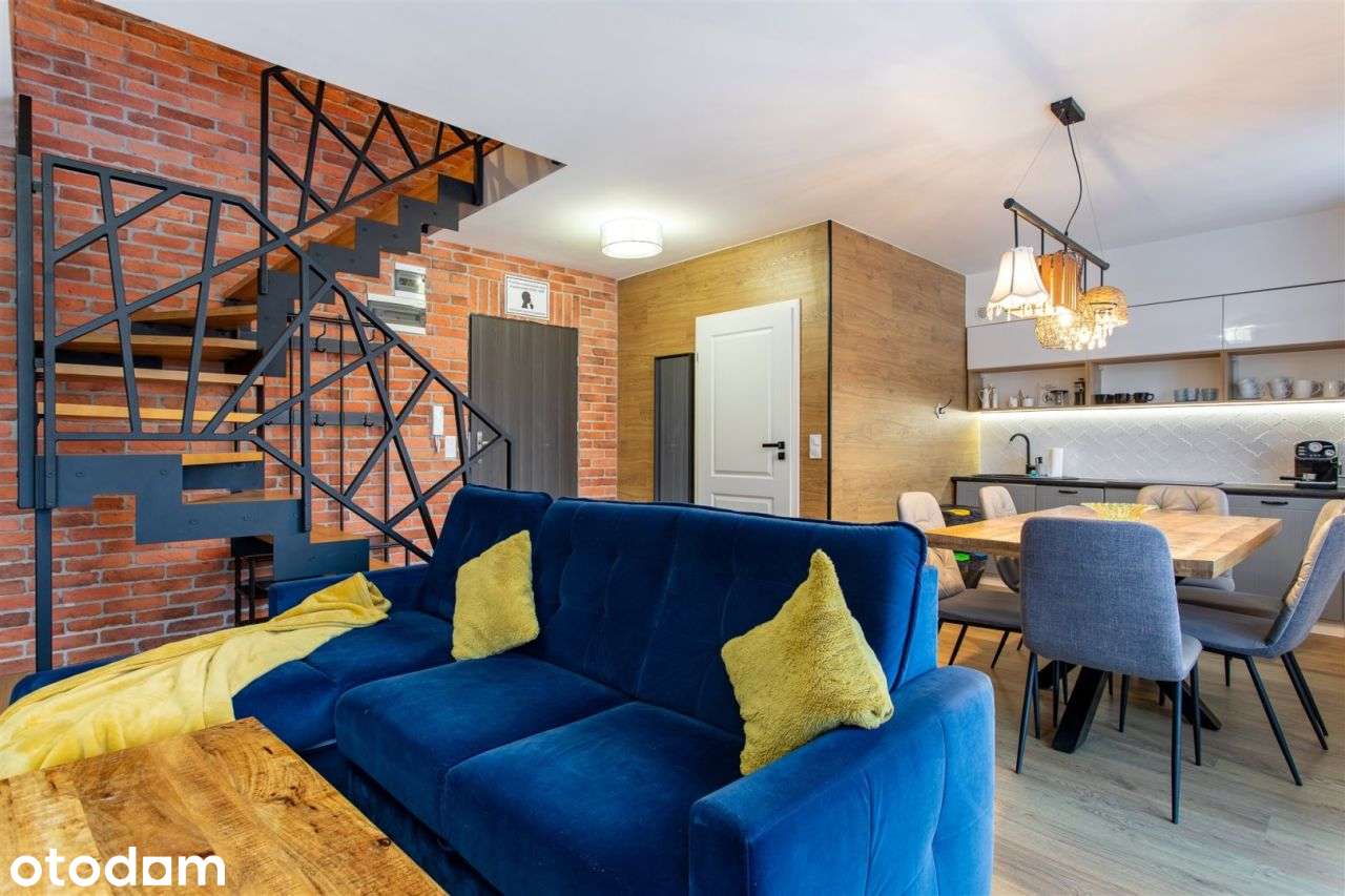 Dwupoziomowy apartament w klimacie industrialnym