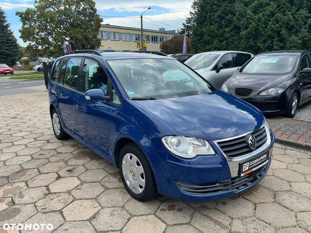 Volkswagen Touran 1.4 TSI DSG Highline - 1