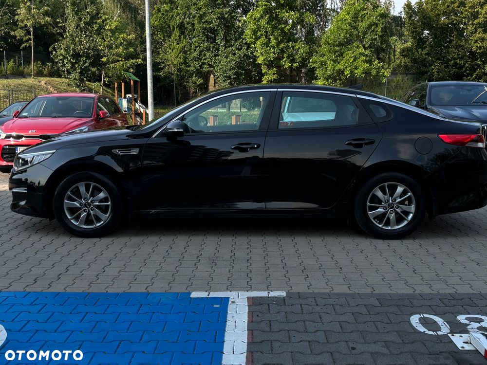 Kia Optima 2.0 L - 8
