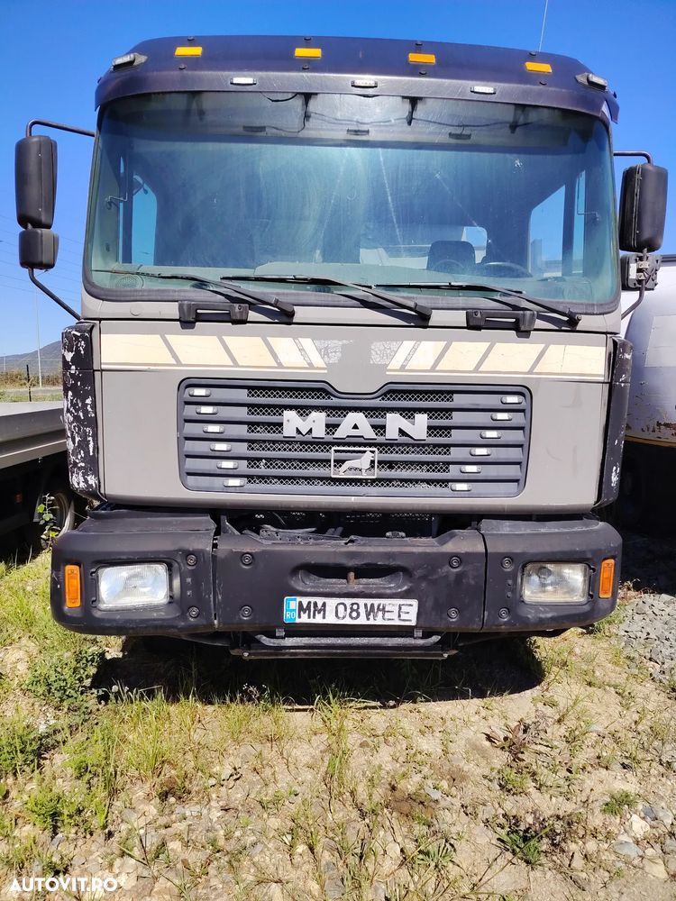 MAN BASCULANTA - 1