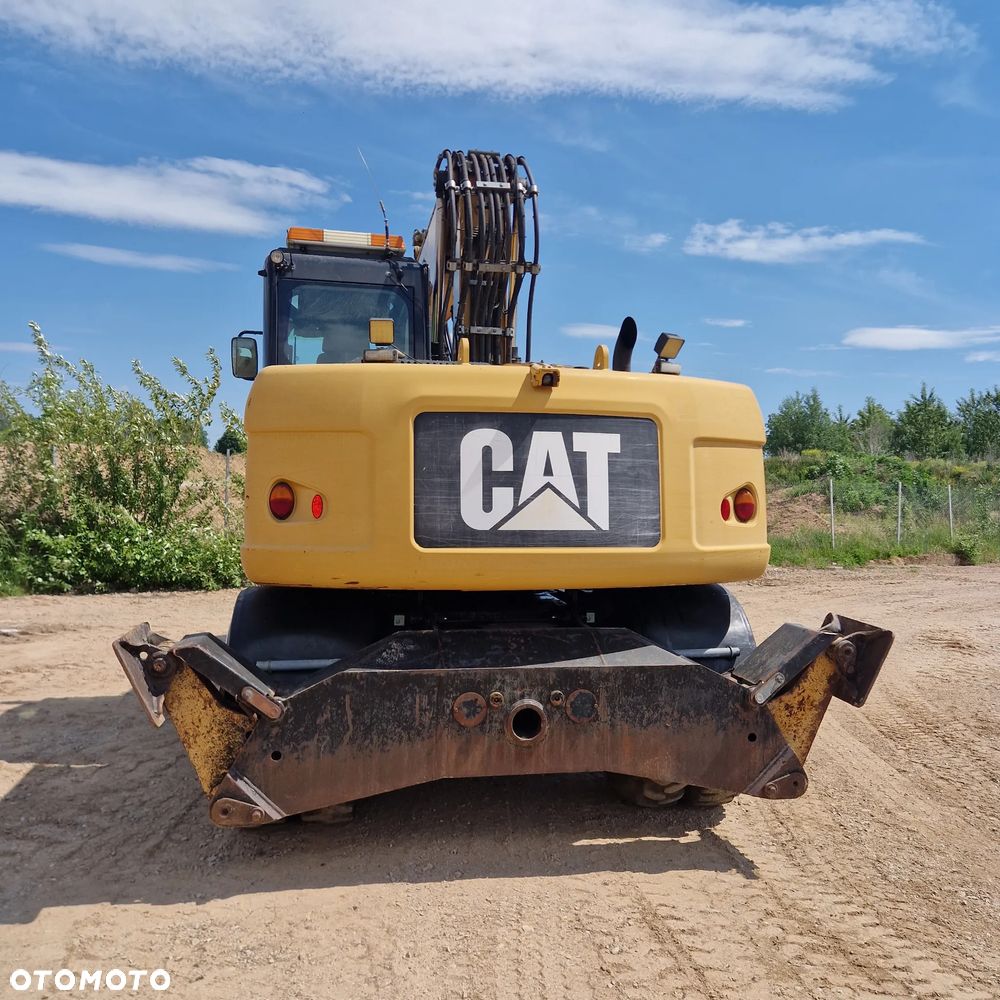Caterpillar M313D - 3