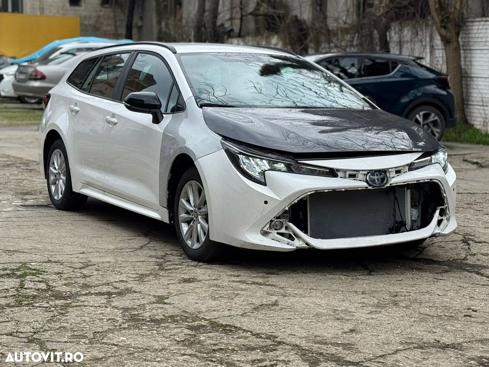 Toyota Corolla 1.8 HSD Business - 4