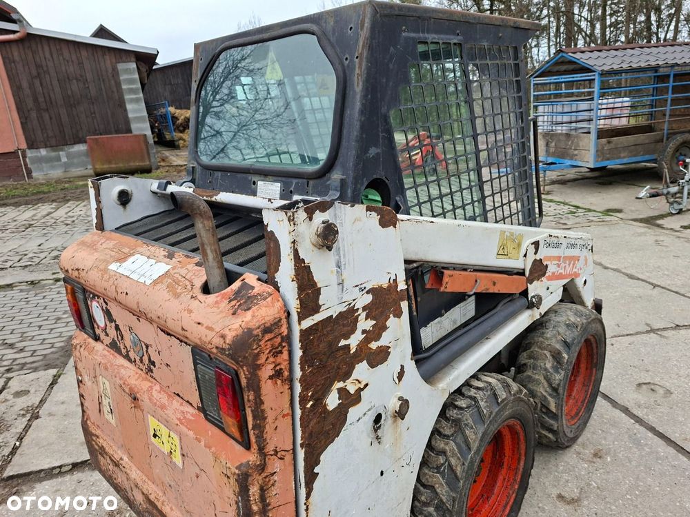 Bobcat 553 4X4 + Melroe Ingersoll-Rand 725S B/H - 27