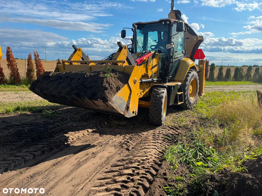 Caterpillar 428 - 1