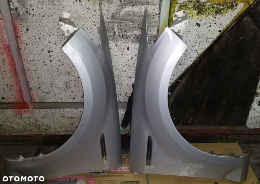 Błotnik lewy Ford Mondeo MK4 lift kod lakieru U7