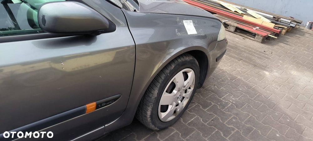BŁOTNIK PRAWY PRZÓD RENAULT LAGUNA I LIFT - 2