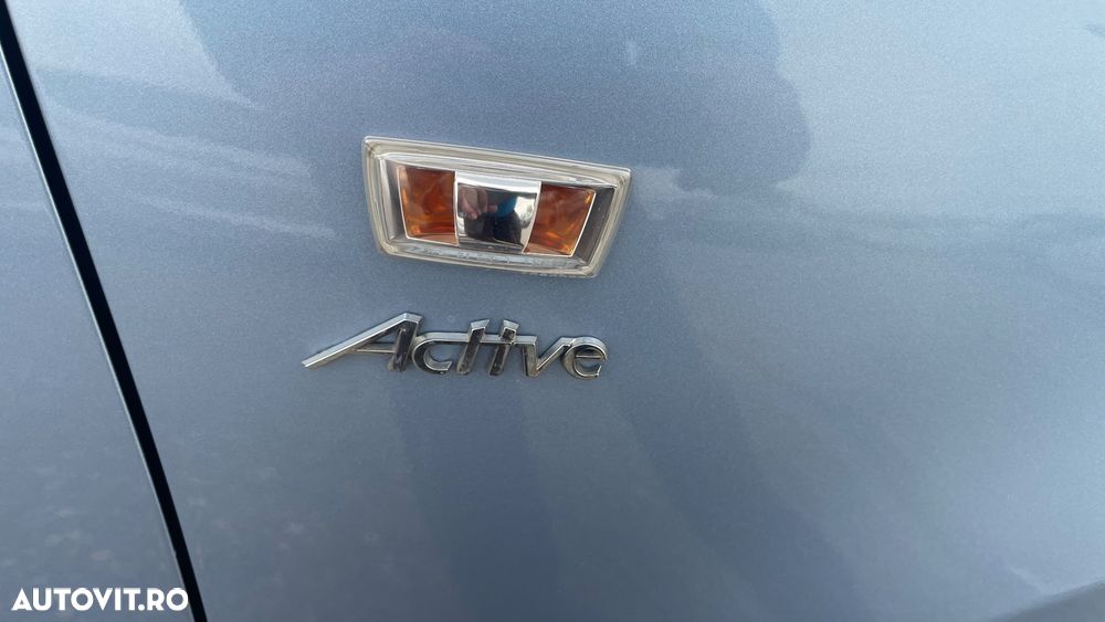 Opel Corsa 1.4 16V Active - 11