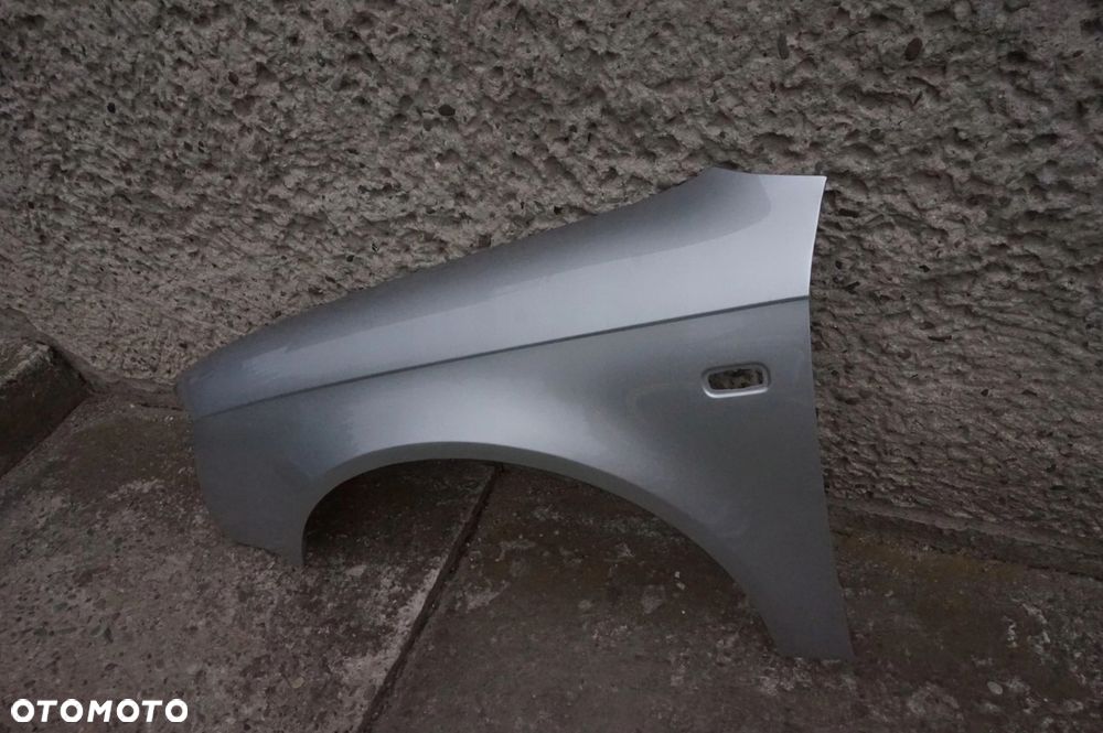 BŁOTNIK PRZEDNI LEWY AUDI A4 B7 LY7W 04/07r - 3