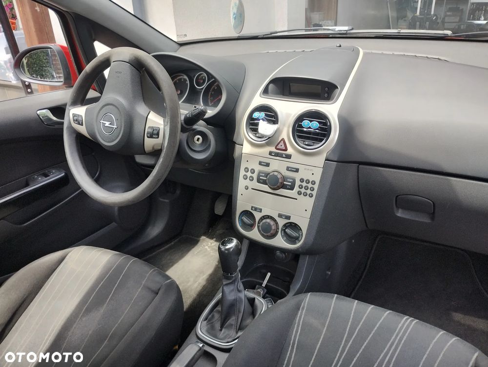 Opel Corsa 1.2 16V Enjoy - 11