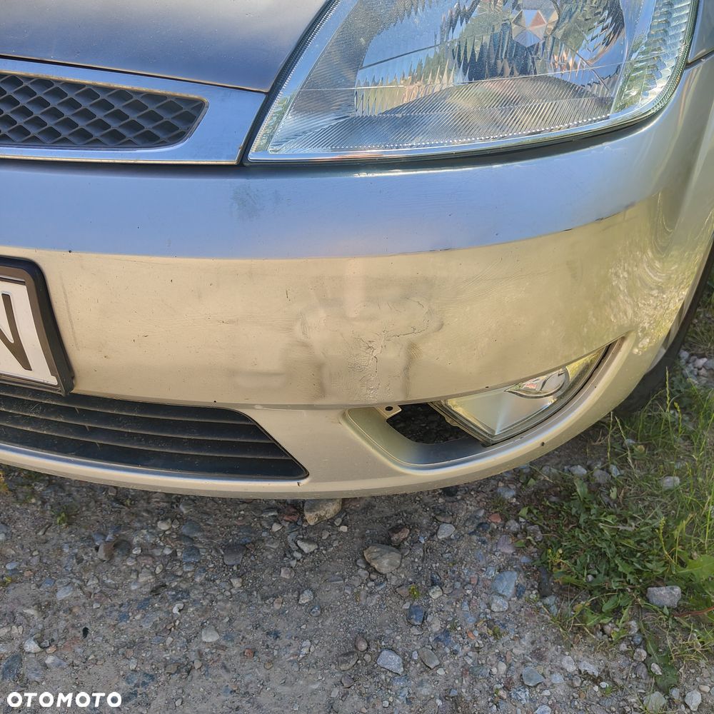 Ford Fiesta 1.4 Ghia - 10