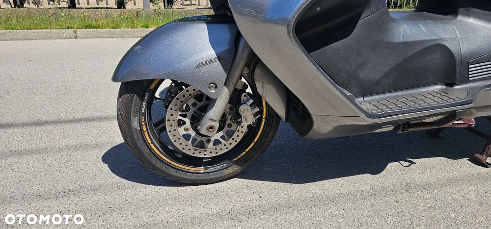 Suzuki Burgman - 10
