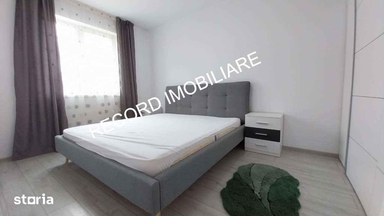 Apartament 2 camere, et.2, balcon, garaj subteran, lift Floresti — fotografia 1