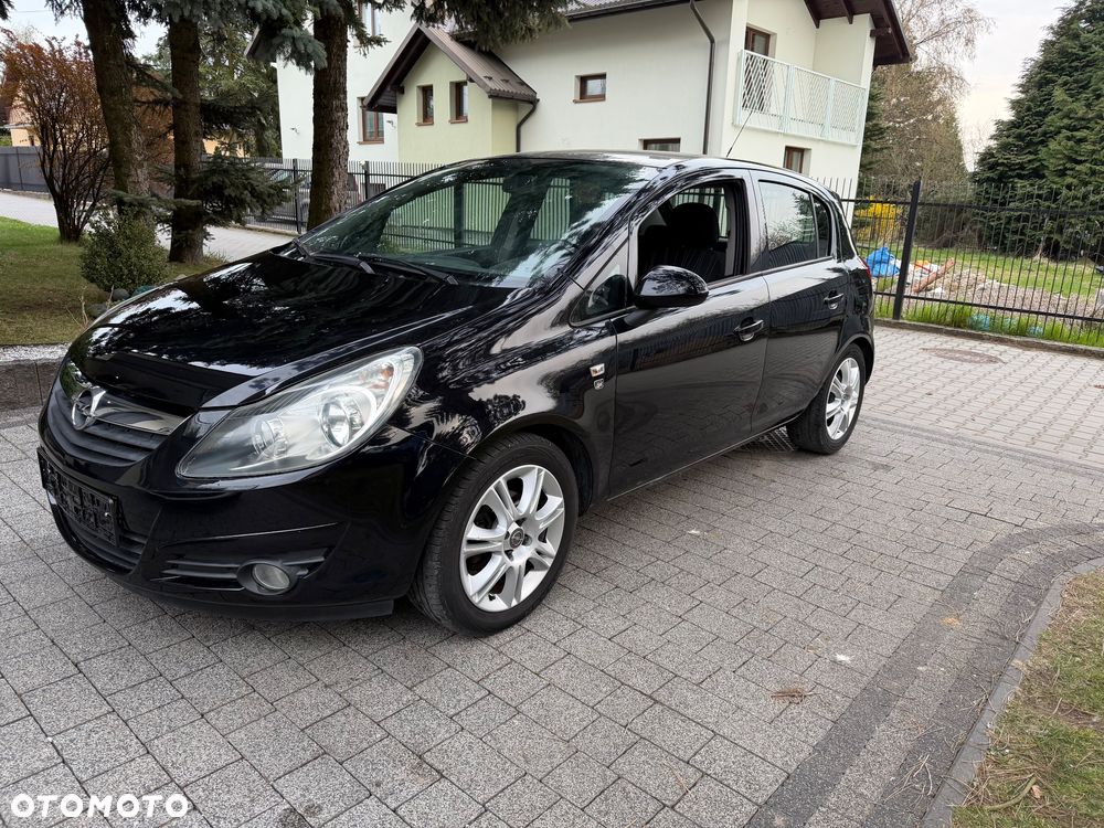 Opel Corsa 1.2 16V Cosmo - 1