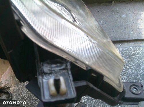 SSANGYONG KORANDO III LEWY HALOGEN ORYGINAŁ 83201-34 - 10