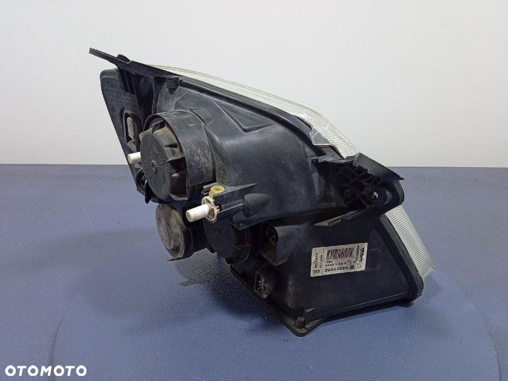 OPEL MERIVA A REFLEKTOR LEWY LAMPA EU 93321052 - 4