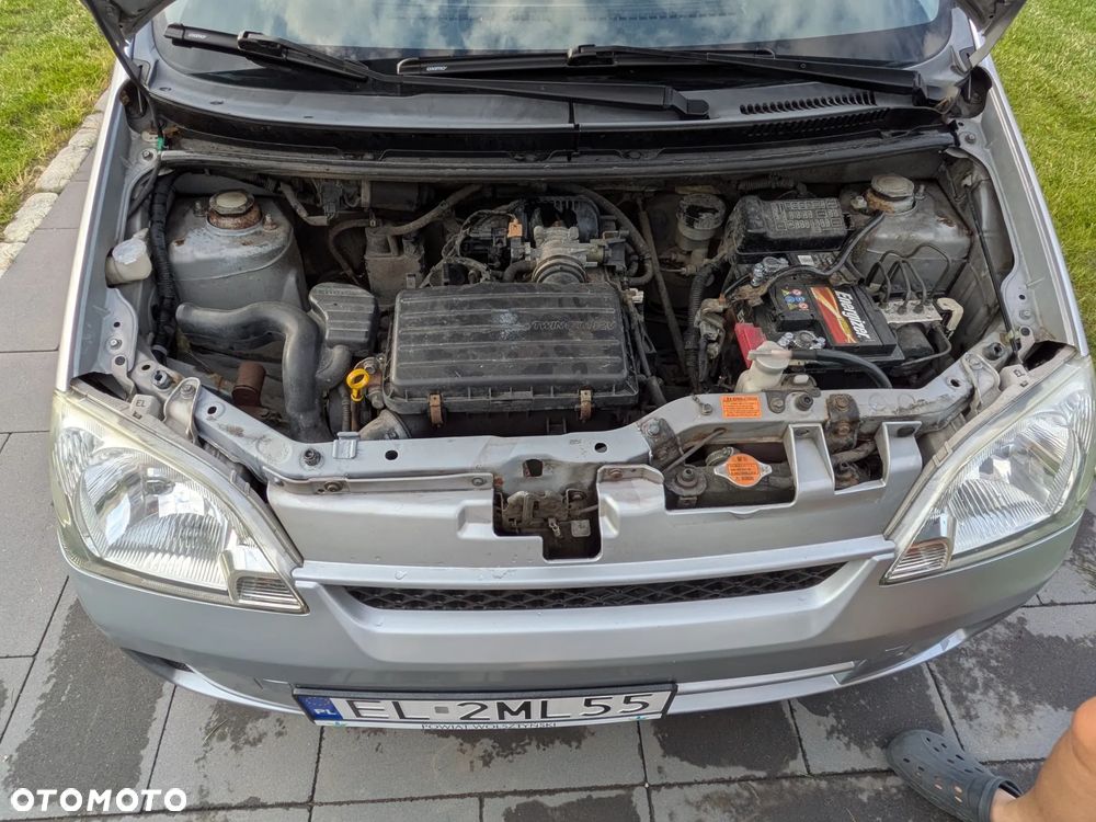 Daihatsu Cuore 1.0 Top - 8