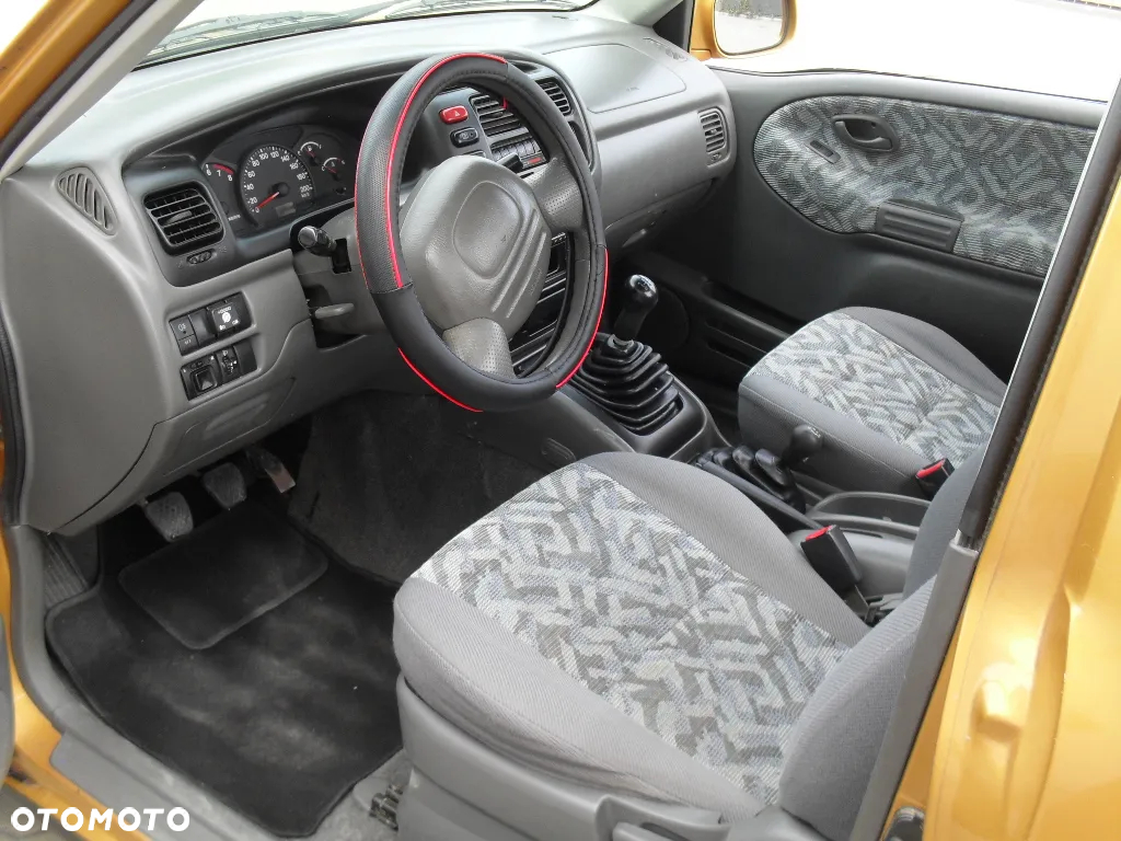 Suzuki Grand Vitara 2.0 - 7