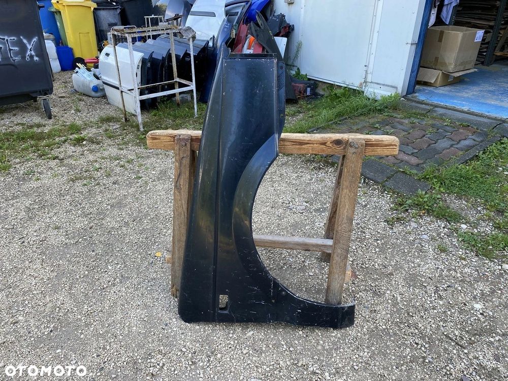 BŁOTNIK PRZEDNI PRAWY VW PASSAT B3 357821106 - 2