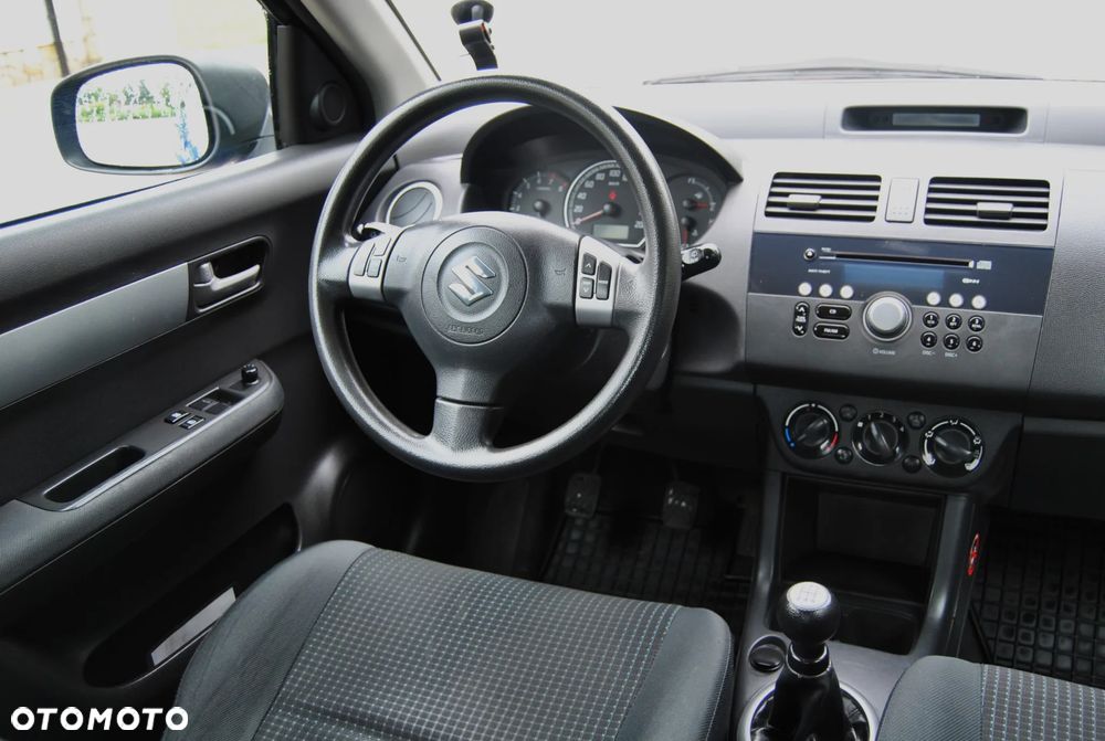 Suzuki Swift 1.3 Club - 11