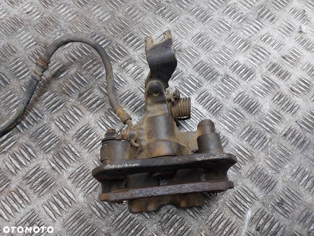 ZACISK HAMULCOWY PRAWY TYŁ MAZDA PREMACY I - 4